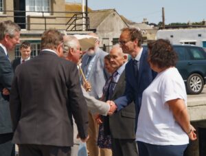 Sam Winters being presented to His Majesty The King when he visited Newlyn Harbour as His Royal Highness The Duke of Cornwall - Image Credit Larry Hartwell